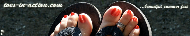 Jeannine`s elegant feet in flip-flops.